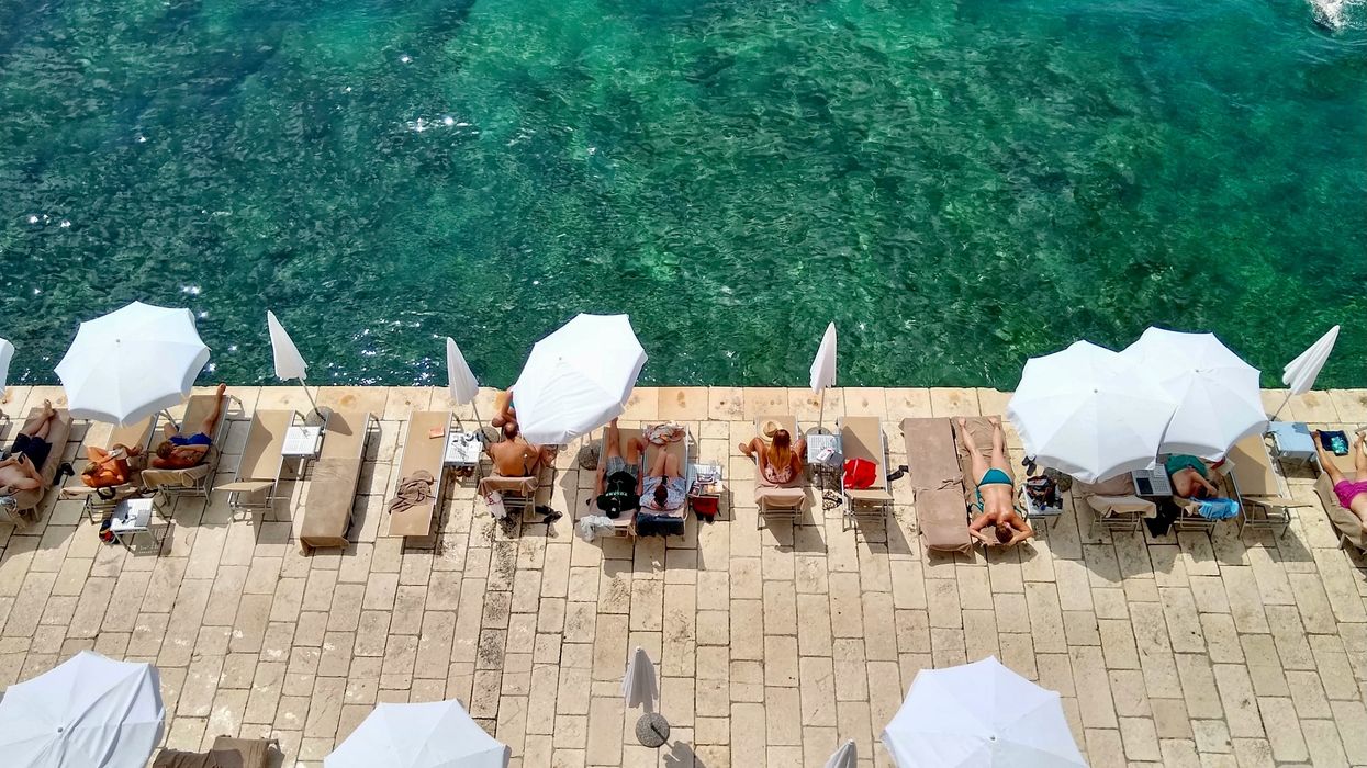 tourists on ocean side deck