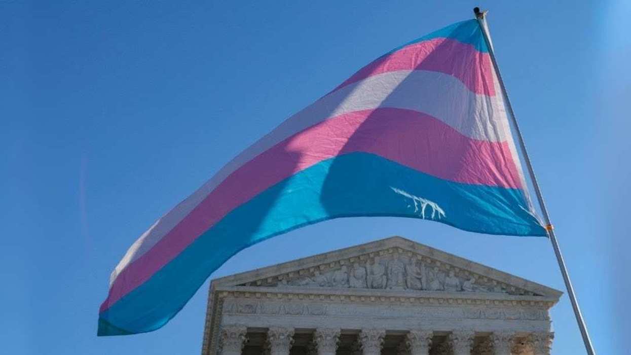 transgender pride flag in front of Supreme Court