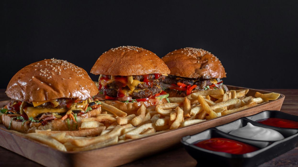 Tray of fast food burgers and fries