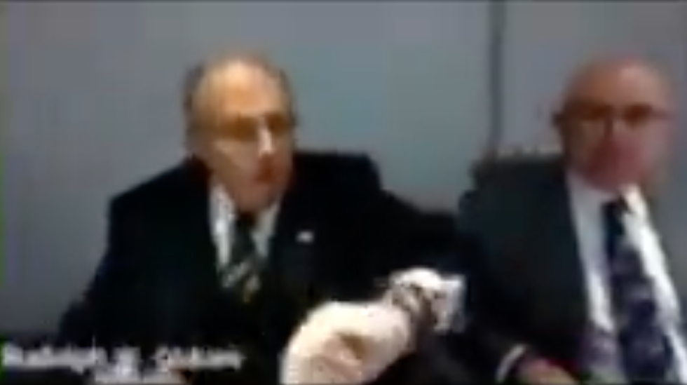 Twitter screenshot of Giuliani noticing two watches on his wrist during court hearing