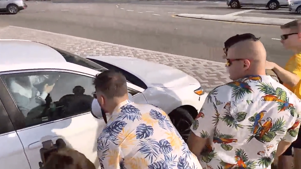 Twitter screenshot of Goyim Defense League members harassing a Jewish Orlando resident in their car