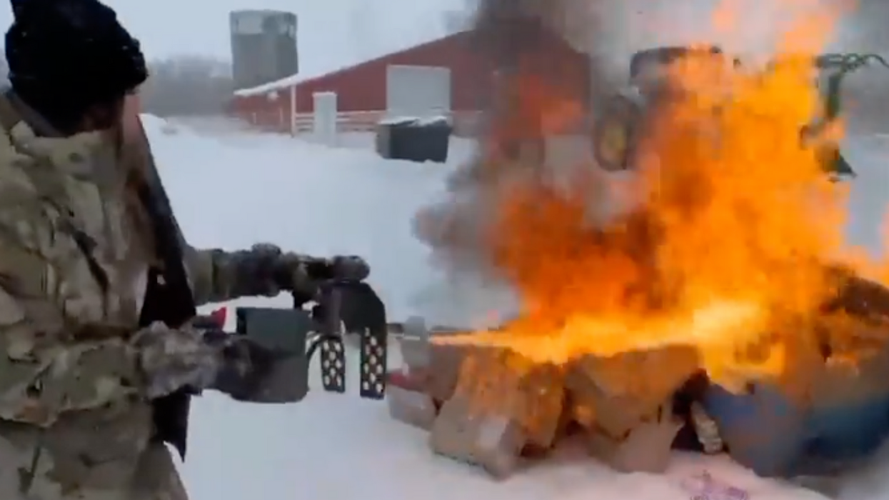 Twitter screenshot of Kristi Noem using her flamethrower