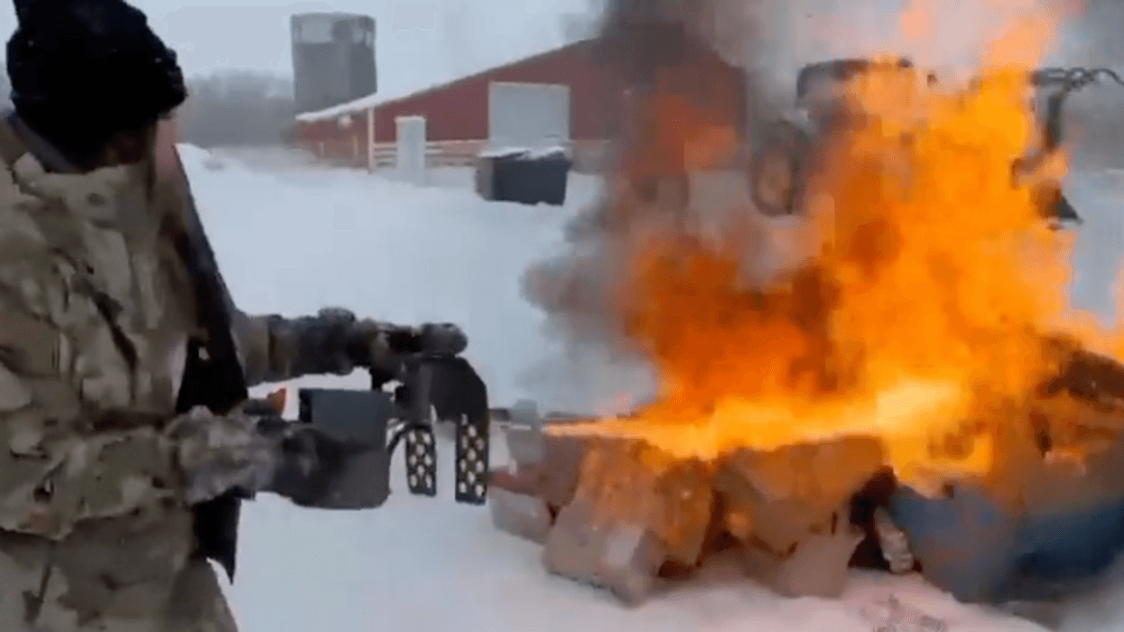 Twitter screenshot of Kristi Noem using her flamethrower