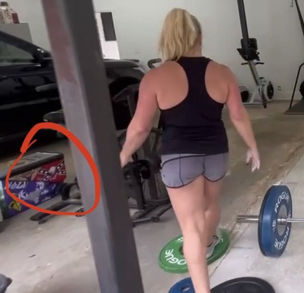 Twitter screenshot of Marjorie Taylor Greene and the Confederate flag-decorated cooler from her workout video