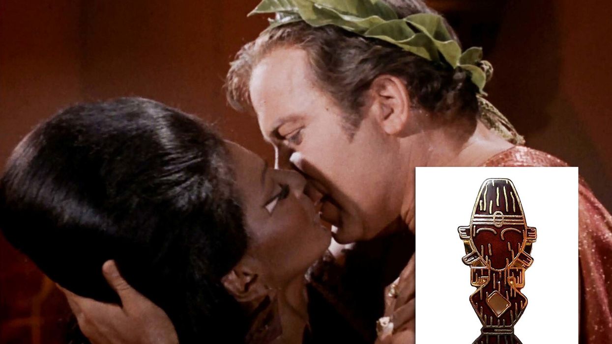 Two characters kissing; inset shows a vintage sci-fi communicator device.