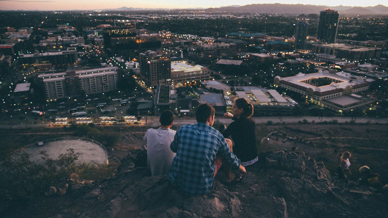 Two men and one woman enjoying the view