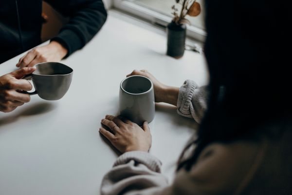 Two People Having Coffee