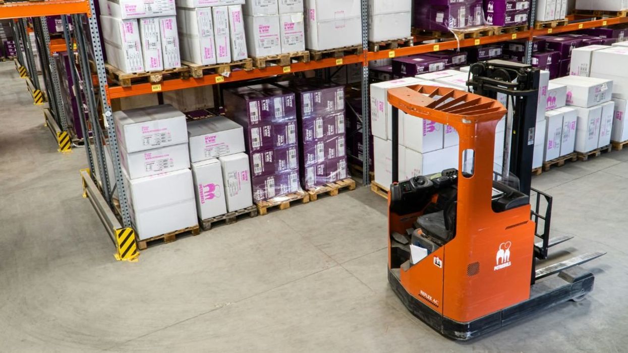 Unoccupied warehouse forklift