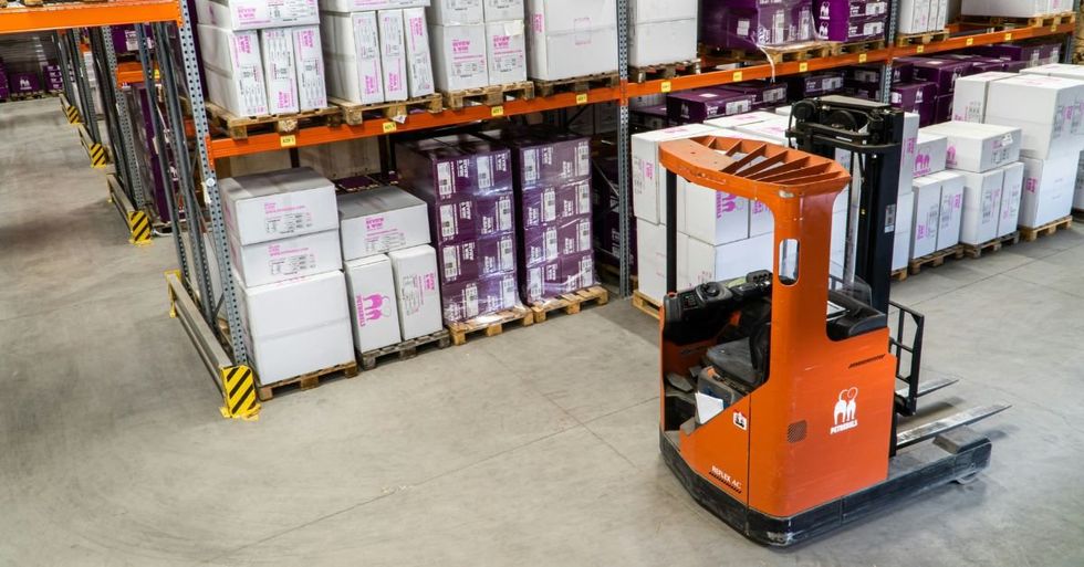 Unoccupied warehouse forklift