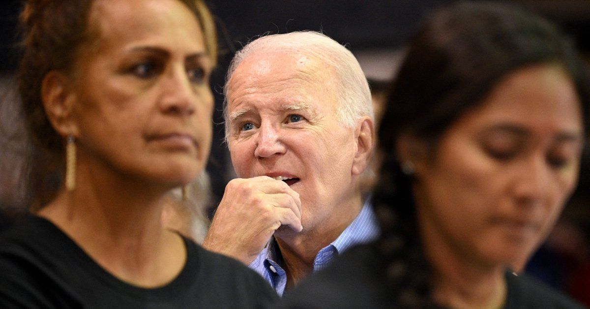 US President Joe Biden gestures as he listens to a speaker during a community engagement event at the Lahaina Civic Center in Lahaina, Hawaii