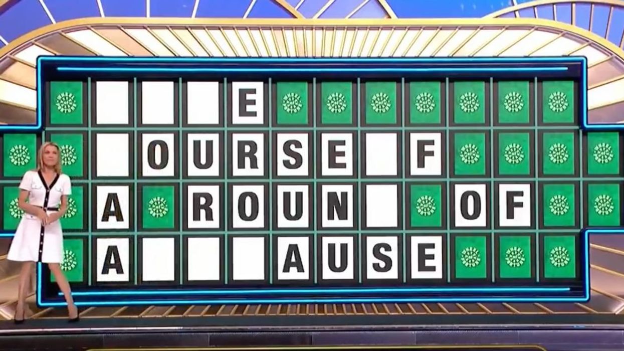 Vanna White with 'Wheel of Fortune' game board