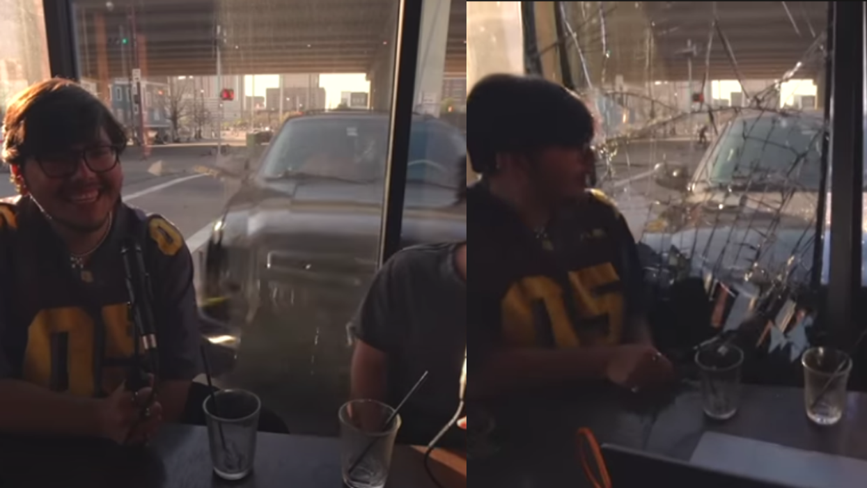 Vehicle smashing into window of coffee shop