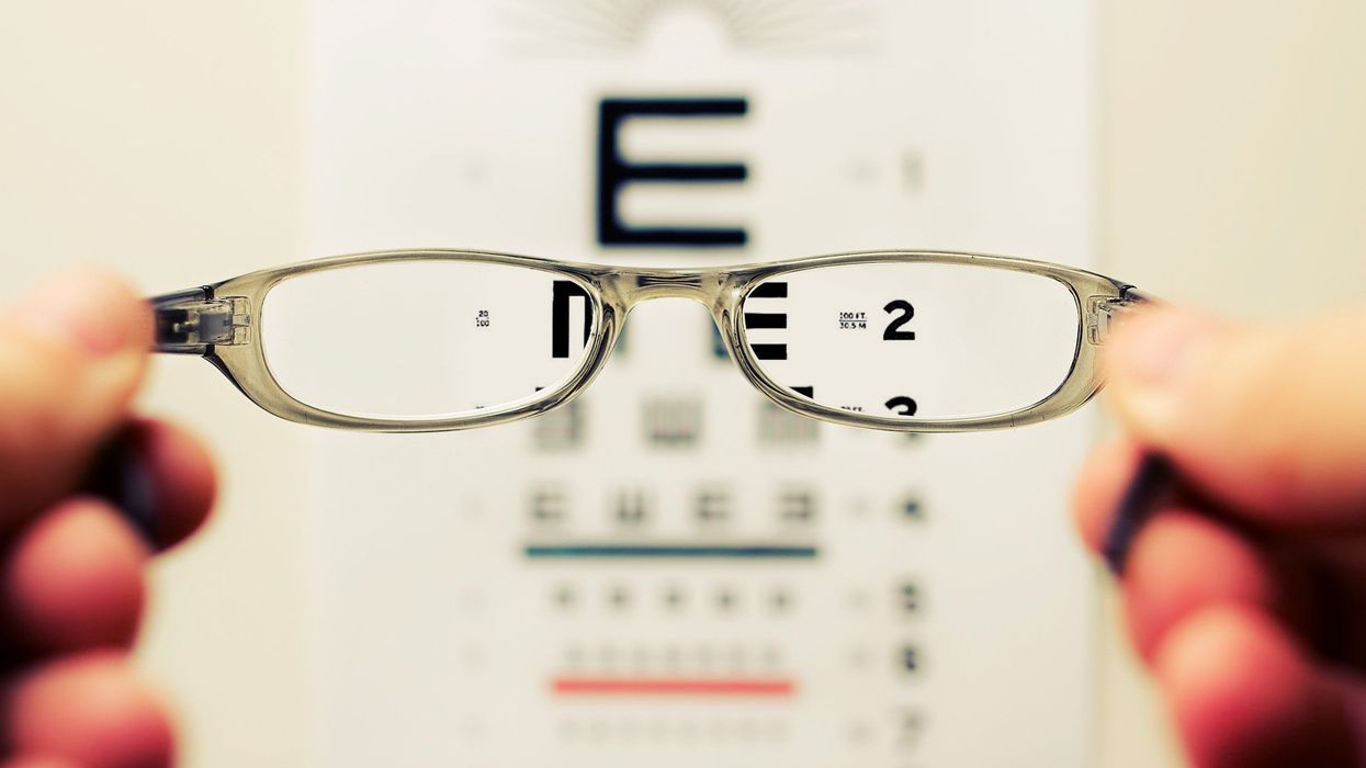 View of eye chart through a pair of spectacles