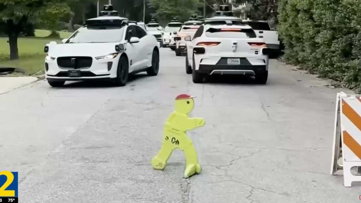 Waymo vehicles crowd an Atlanta cul-de-sac during the viral incident.