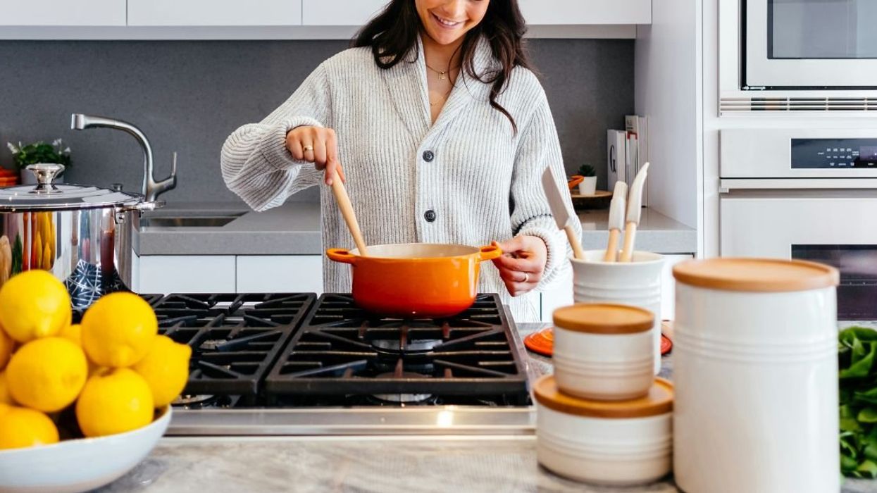 Woman cooking in kitchen