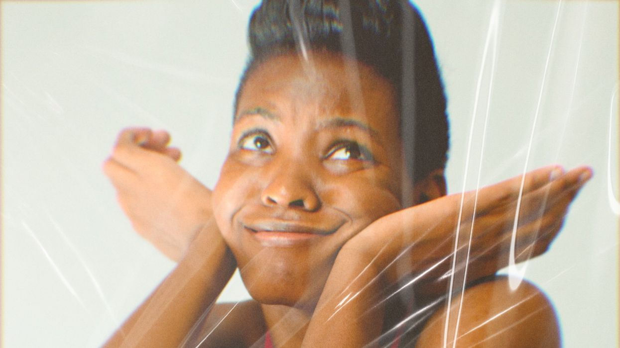 woman in black pants and red tank top