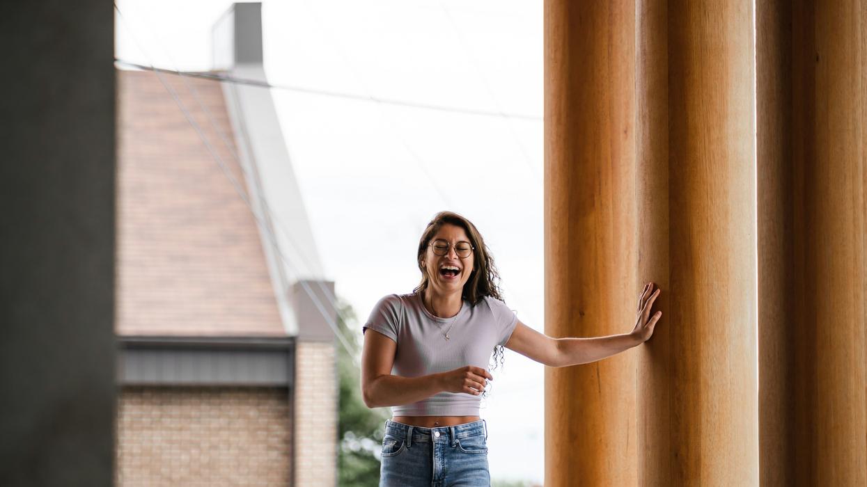 Woman laughing hard