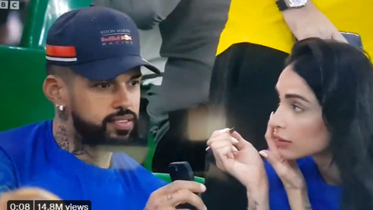 Woman looking at man after he winked at someone