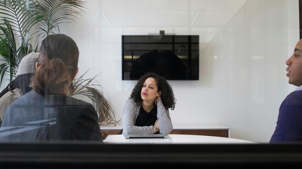 Woman looking bored during meeting