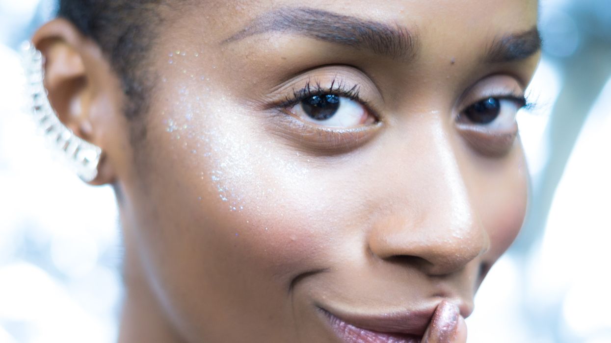 woman making the shushing gesture