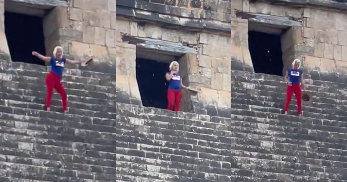 woman on the steps of Mayan pyramid