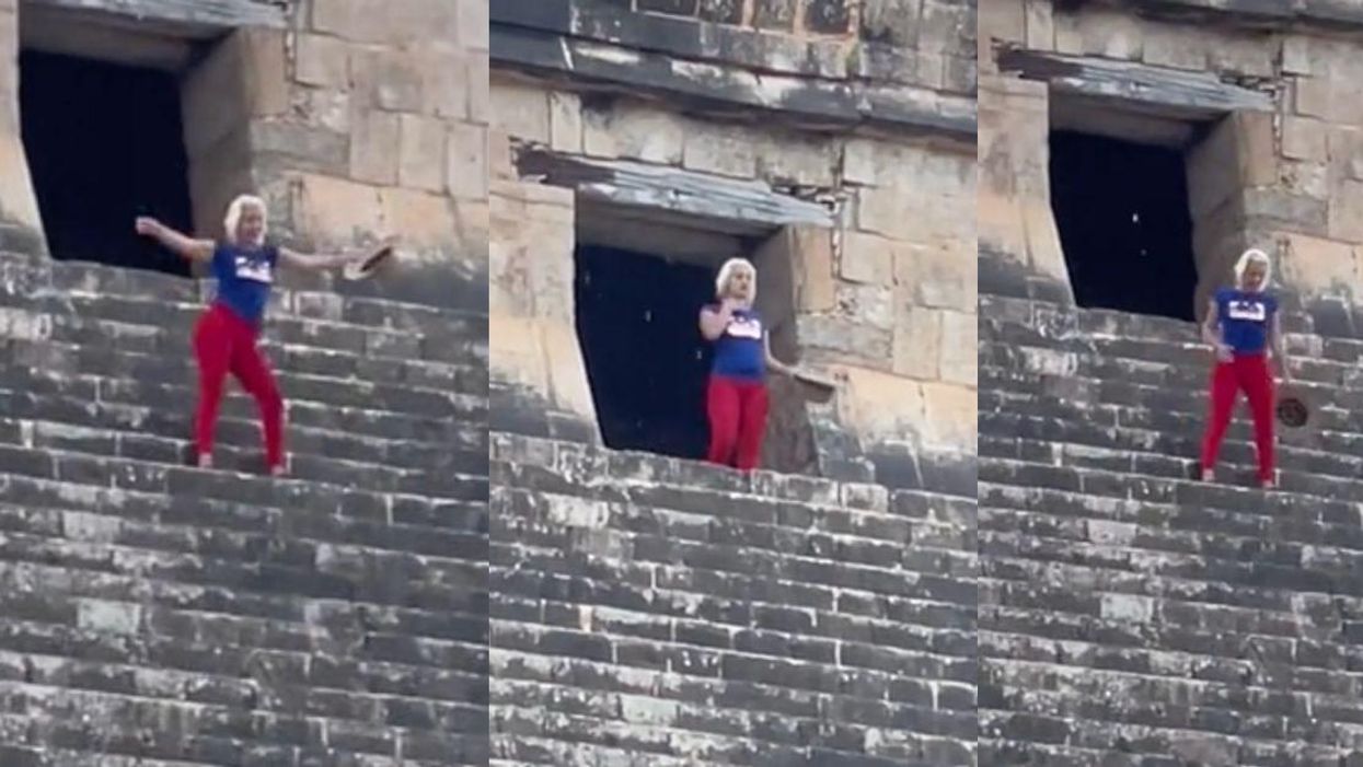 woman on the steps of Mayan pyramid