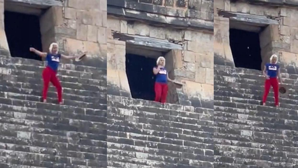 woman on the steps of Mayan pyramid
