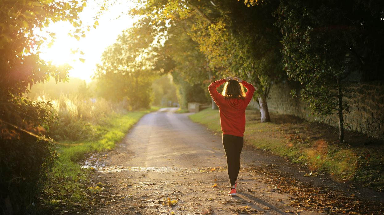 Woman walking down a path