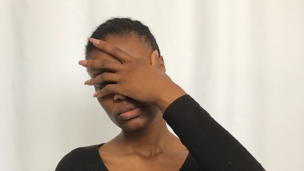 Woman with face to palm