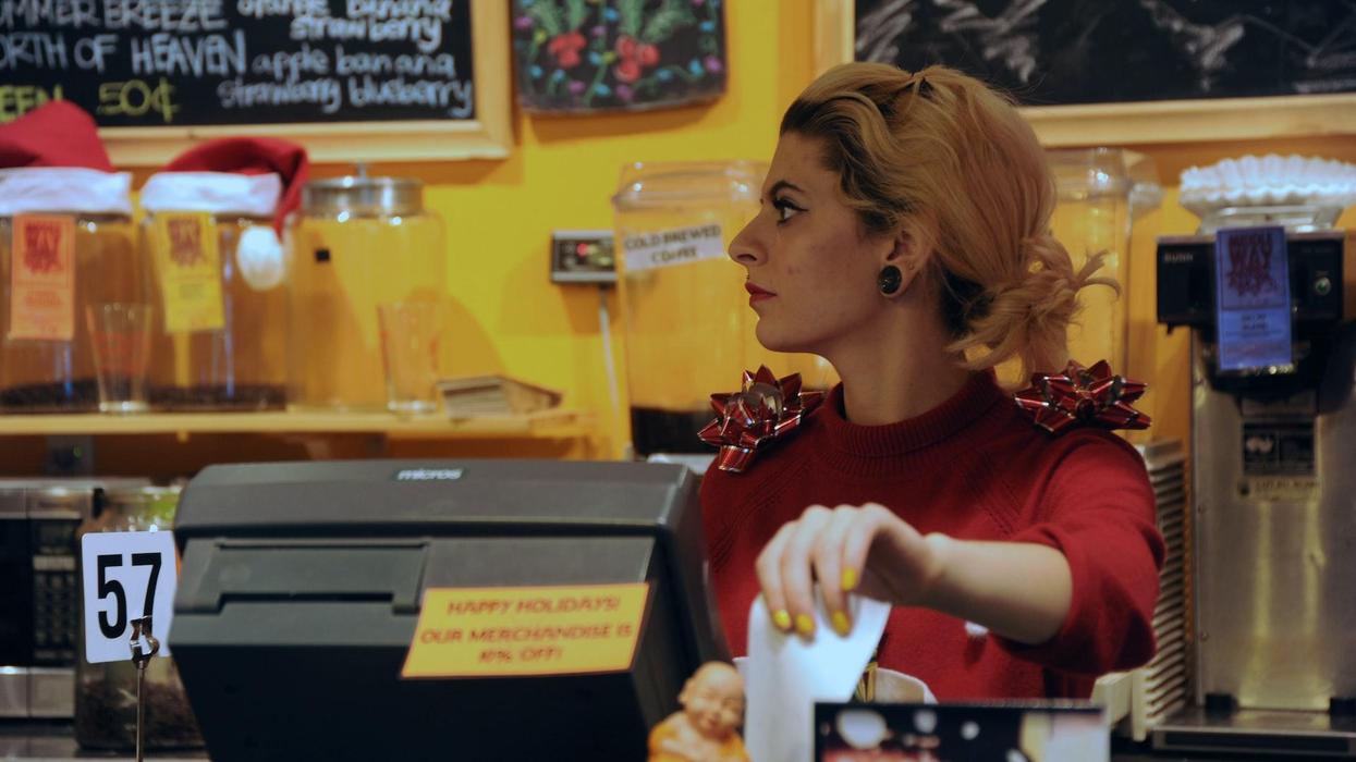 Women ripping a receipt in a restaurant