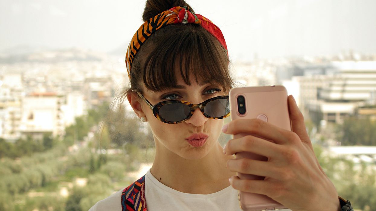 Young woman taking a selfie