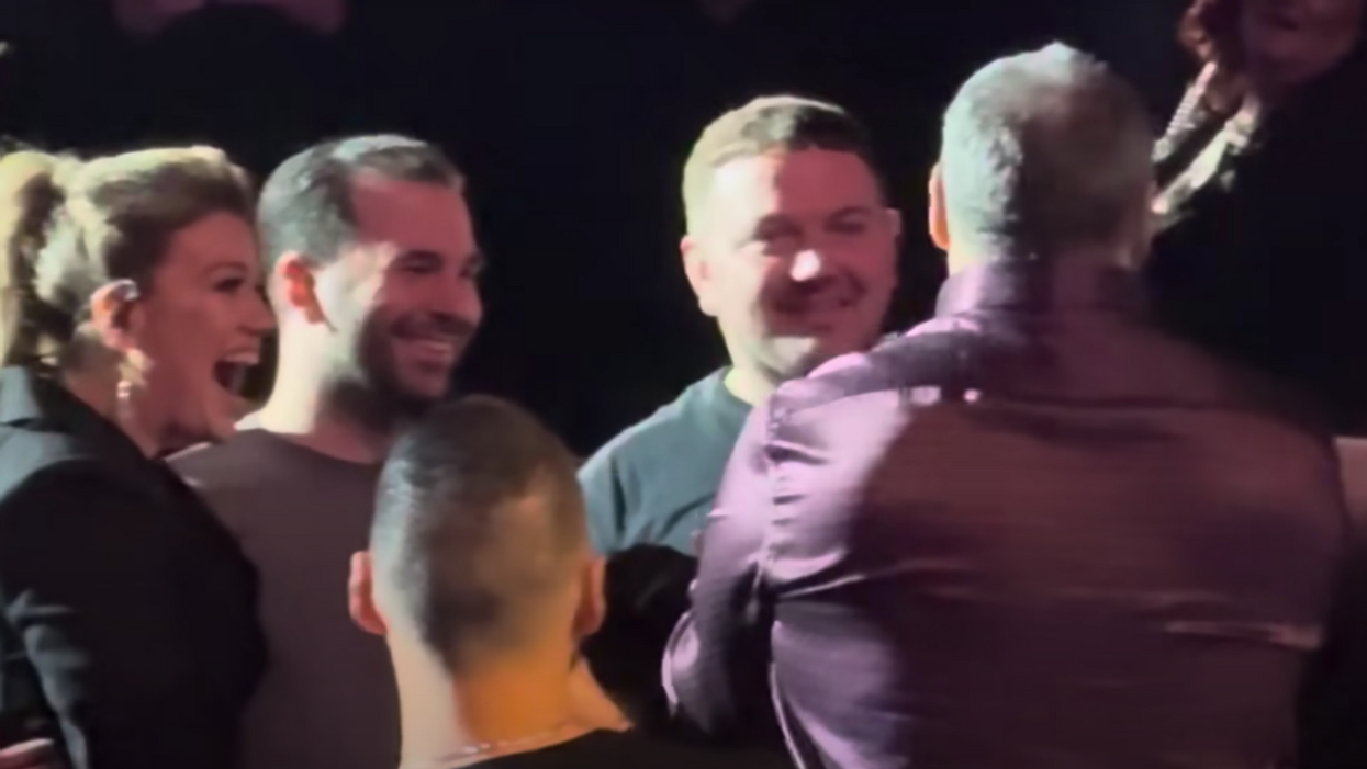 YouTube screenshot of couple getting married with Kelly Clarkson