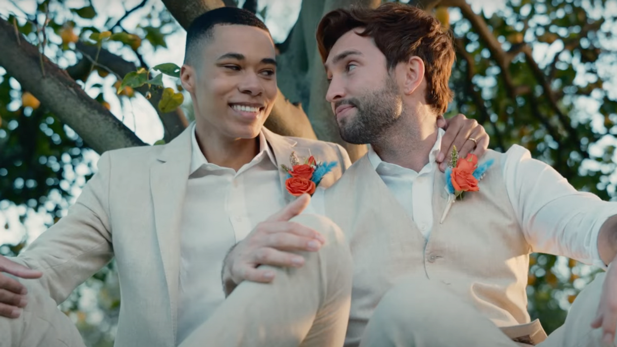 YouTube screenshot of gay couple from Men's Wearhouse ad