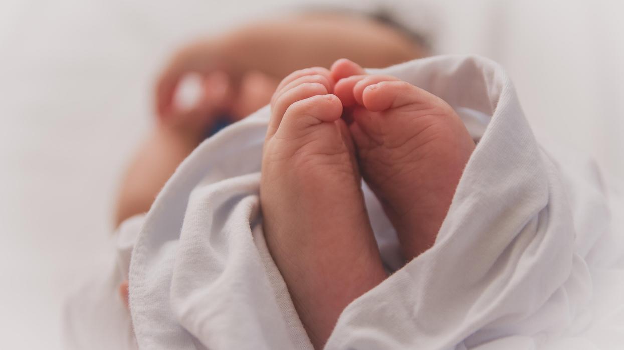 Zoom in on newborn baby's feet
